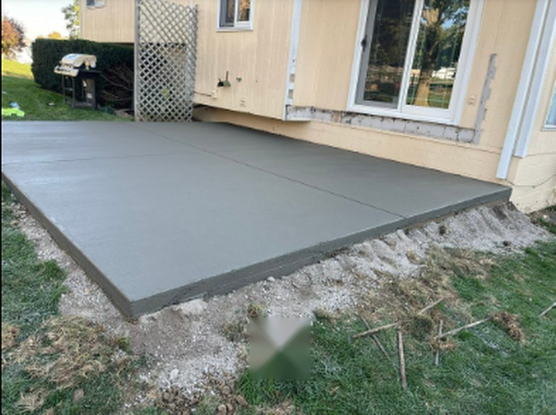 Custom backyard concrete patio poured by Twins Concrete in Lincoln, Nebraska